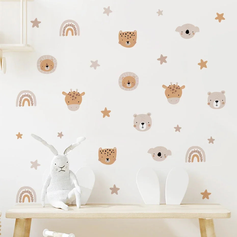 Children's room with animal-themed wall decals and toys on a table.
