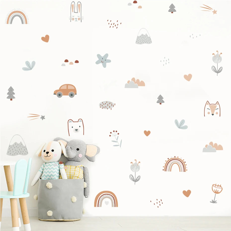 Children's room with wall stickers of animals, plants, and geometric shapes.