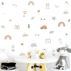 Children's room with wall stickers, toys, and a small table.