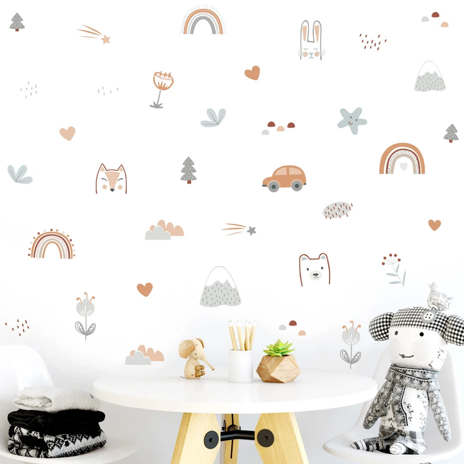 Children's room with wall stickers, toys, and a small table.