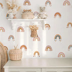 Children's room with rainbow decals on the wall, shelves with toys, and decorative elements.