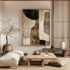 Modern living room with abstract art, wooden coffee table, and decorative elements.