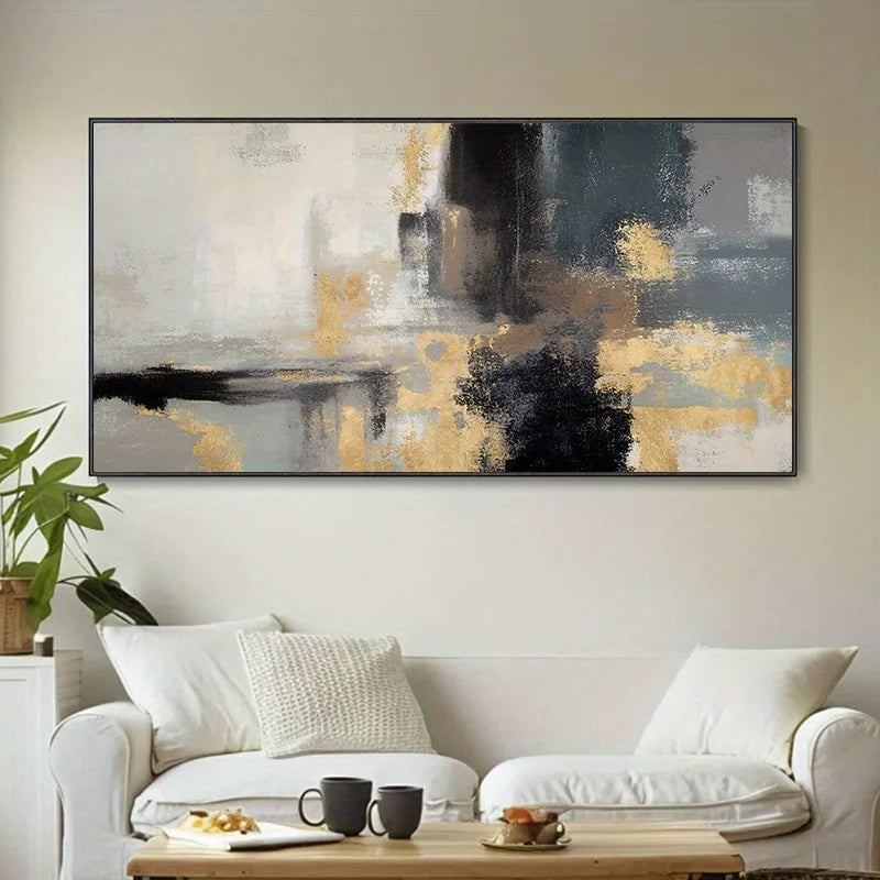 Abstract painting in a living room with a white sofa and coffee table.