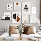 Decorative wall art in a living room with abstract designs and neutral colors.