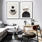 Modern living room with abstract wall art, a sofa, and coffee table.
