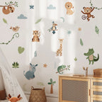 Children's room with jungle animal wall decals on a white wall.