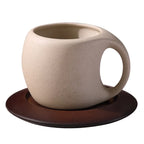 Sculptural Beige Ceramic Coffee Cup with Oversized Circular Handle – Modern Minimalist Mug & Saucer Set for Stylish Home Café Décor