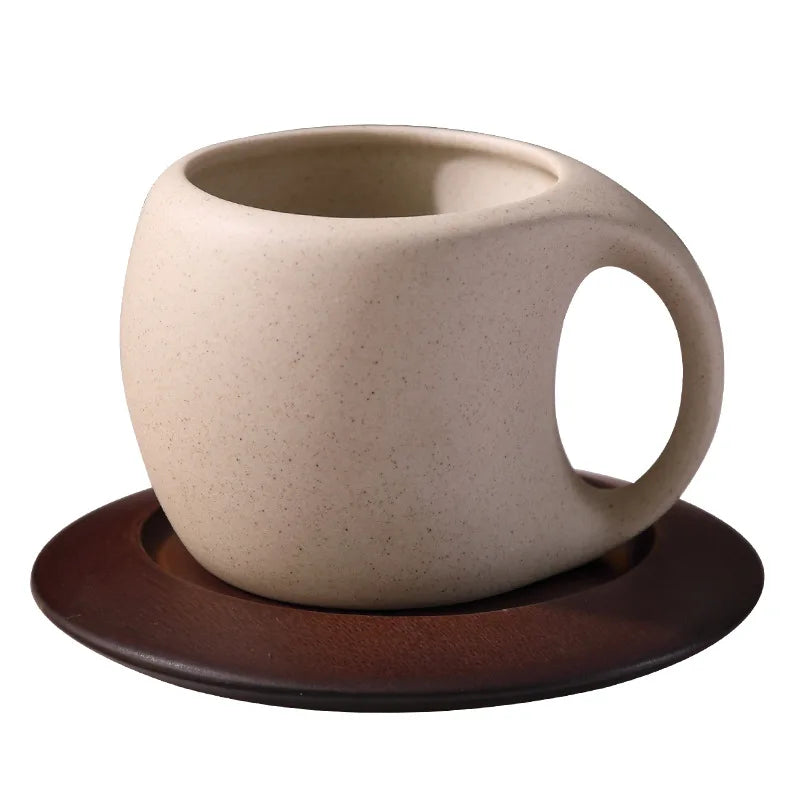 Sculptural Beige Ceramic Coffee Cup with Oversized Circular Handle – Modern Minimalist Mug & Saucer Set for Stylish Home Café Décor