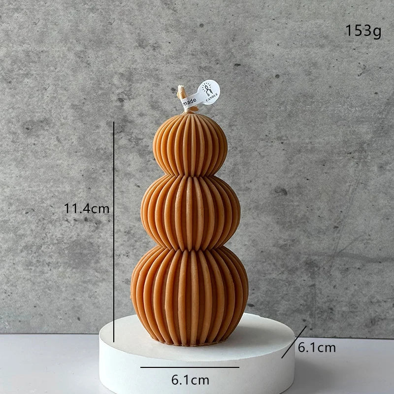 Stacked brown ceramic bowls on a white base with measurements and weight displayed against a gray background