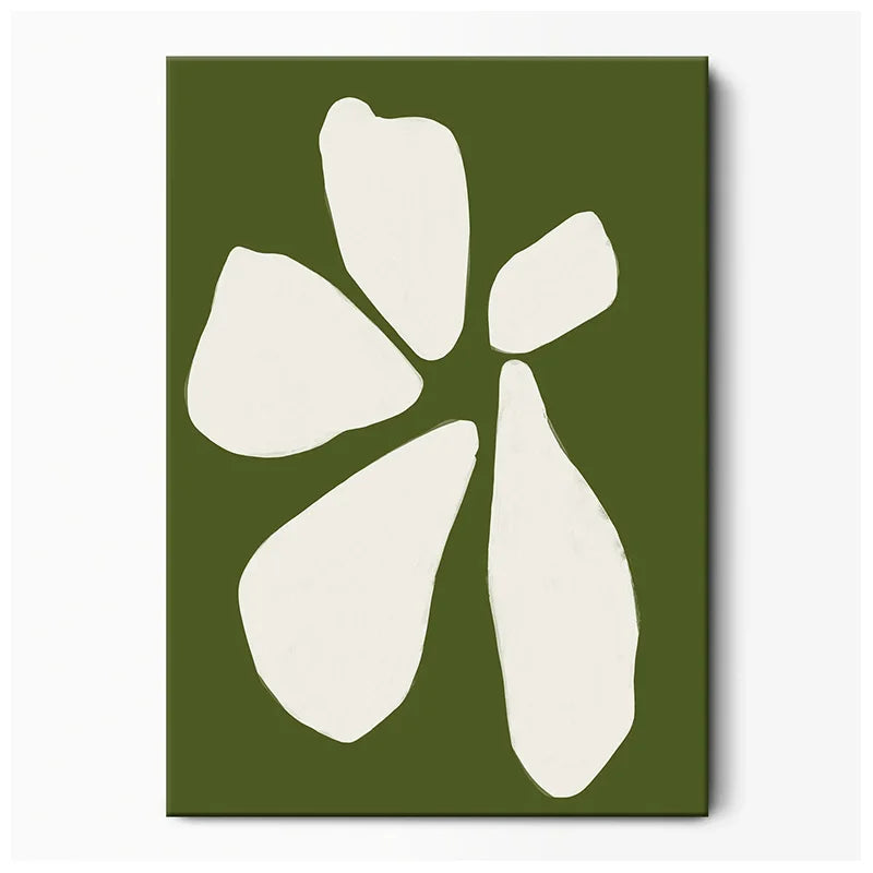 White abstract flower shape on a green background