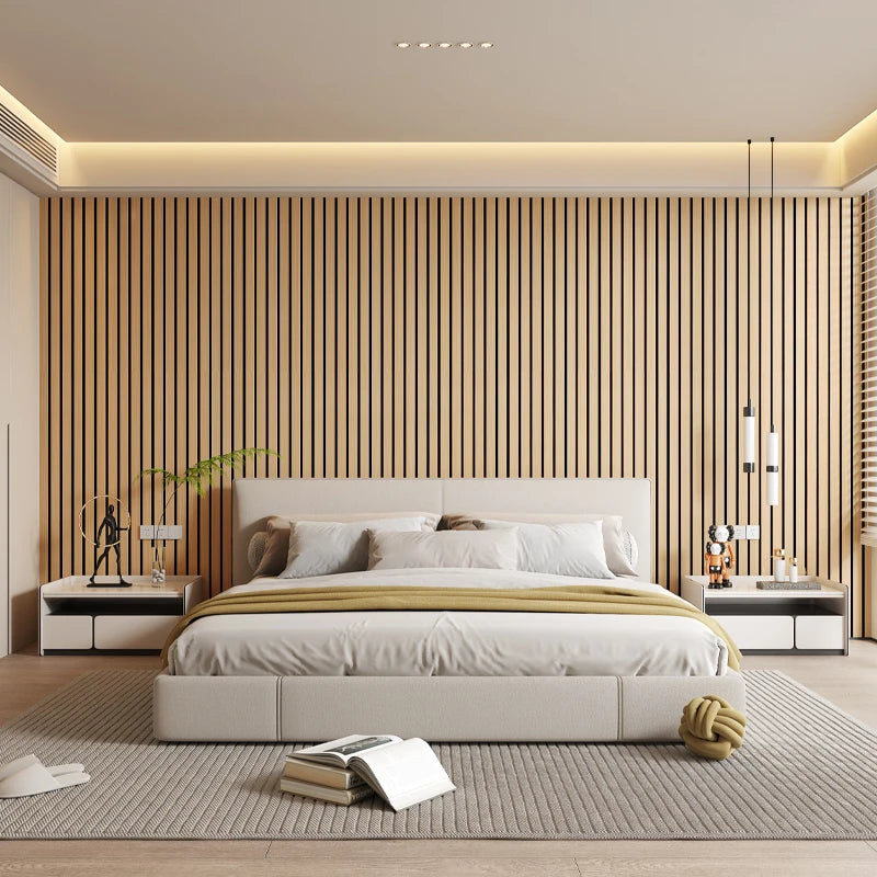 Modern bedroom with a bed, striped wall, and side tables.