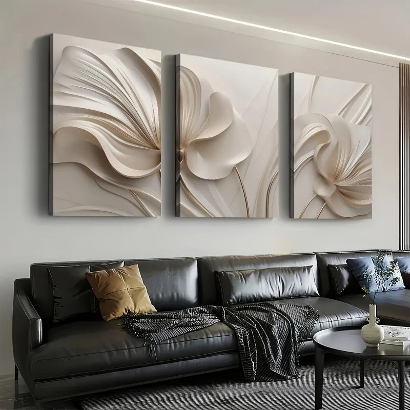 Modern living room with a black sofa and decorative wall art.