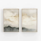 Two abstract art pieces in wooden frames on a white wall