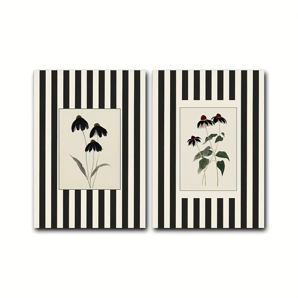 Two vertical canvas wall art prints with black and white vertical stripes, each featuring a central botanical illustration. The left print shows black coneflowers on a cream background, and the right print shows similar flowers with green leaves and red buds on a cream background.