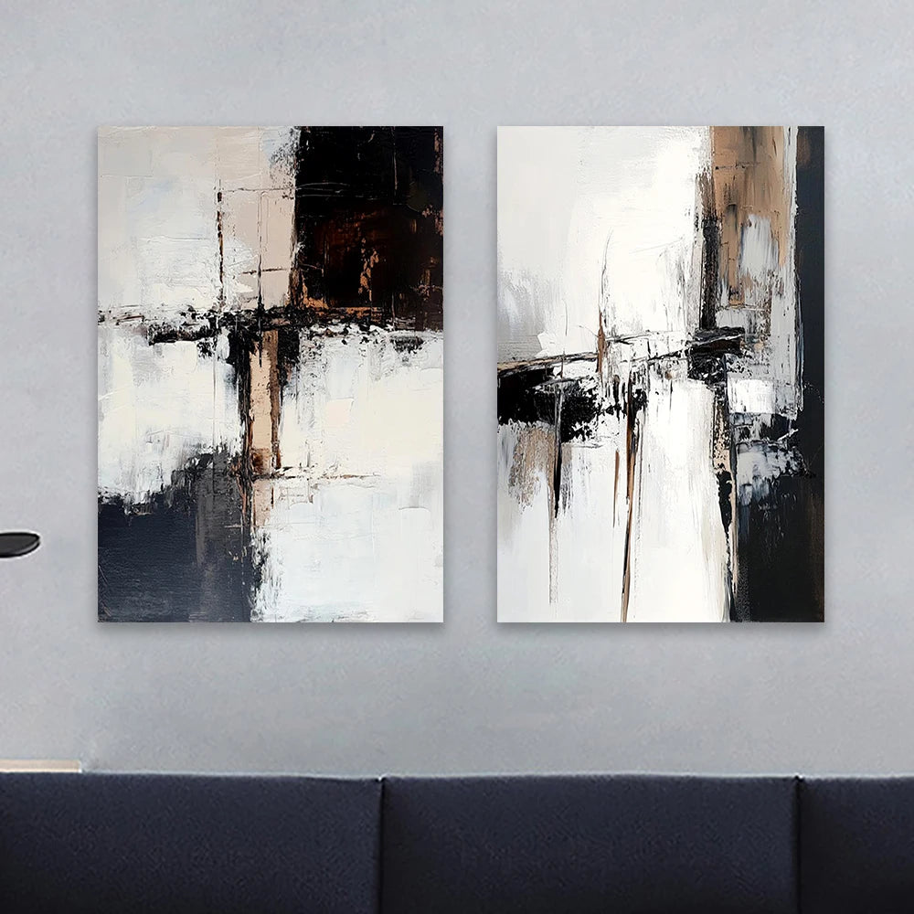 Two abstract paintings on a wall above a sofa