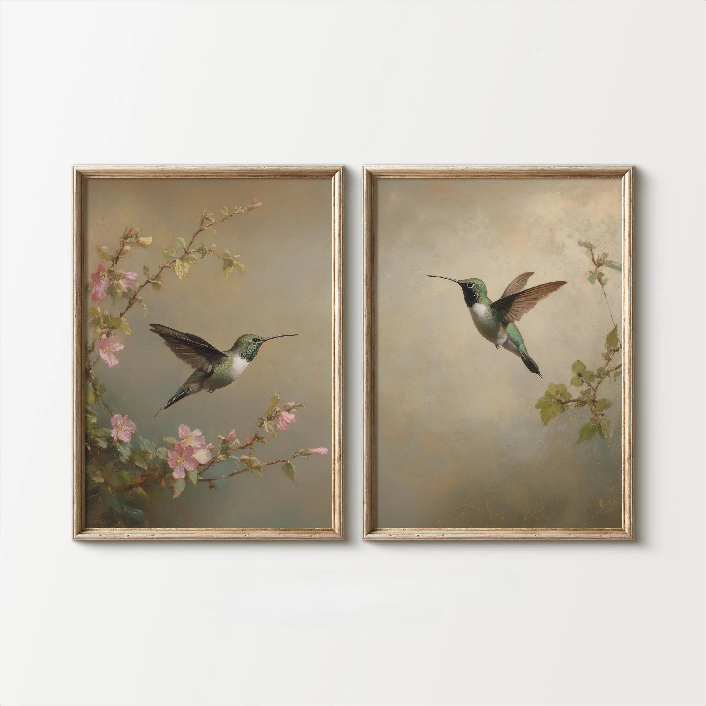 Two framed paintings of hummingbirds and flowers on a white background