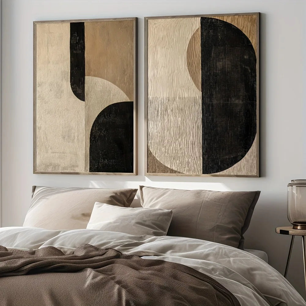 Abstract wall art above a bed in a bedroom setting