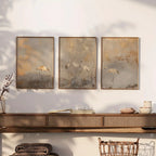 Three framed artworks of birds on a wall above a wooden console table.