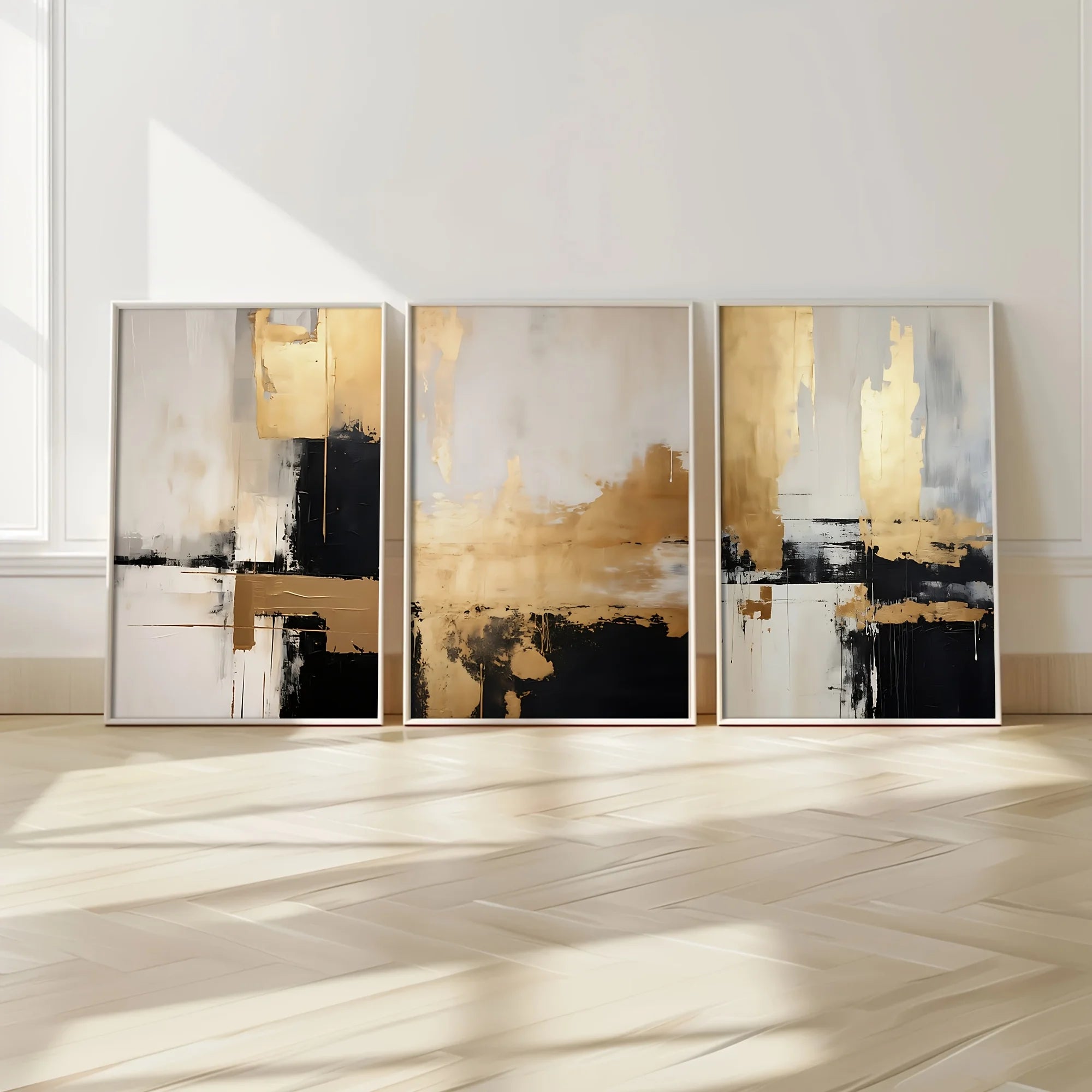 Set of three abstract art pieces in a modern interior setting