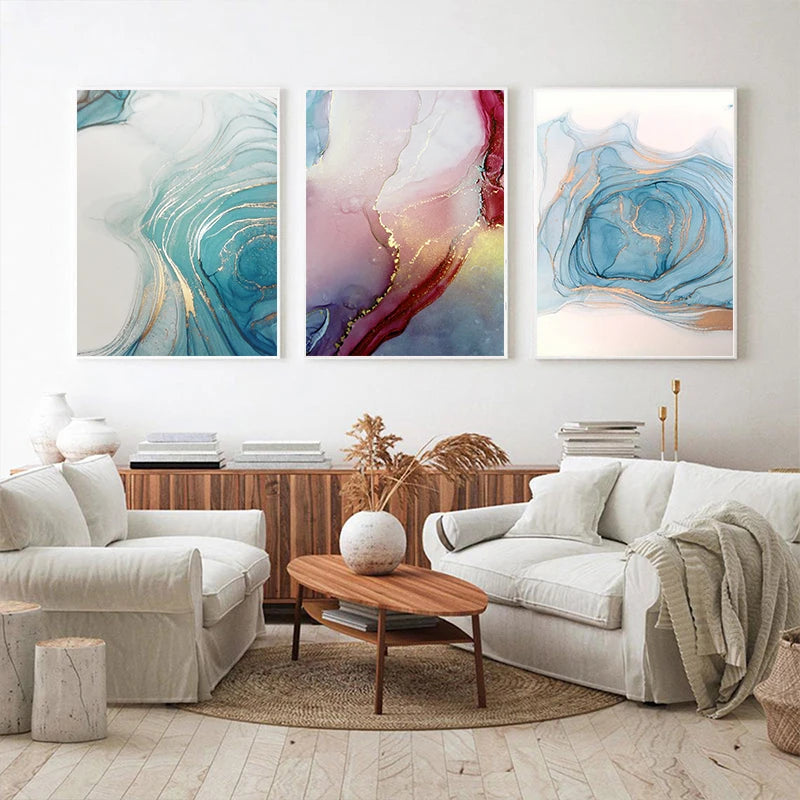 Living room with abstract wall art and white furniture