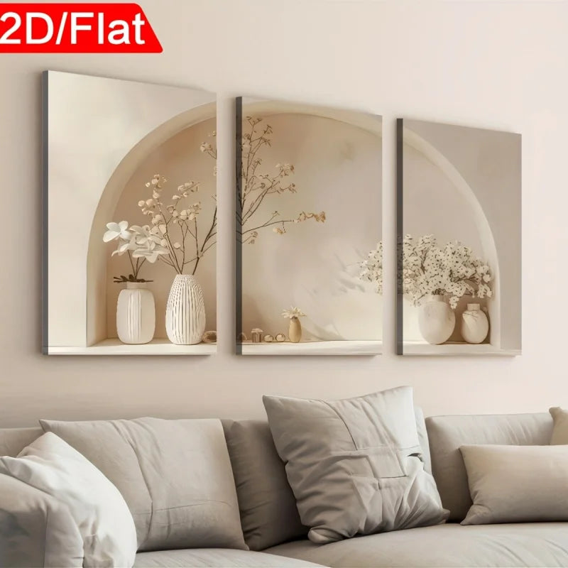 Three framed wall art pieces with floral designs above a sofa.