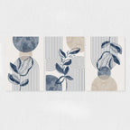 Set of three abstract wall art prints with geometric shapes and plant elements on a white background.