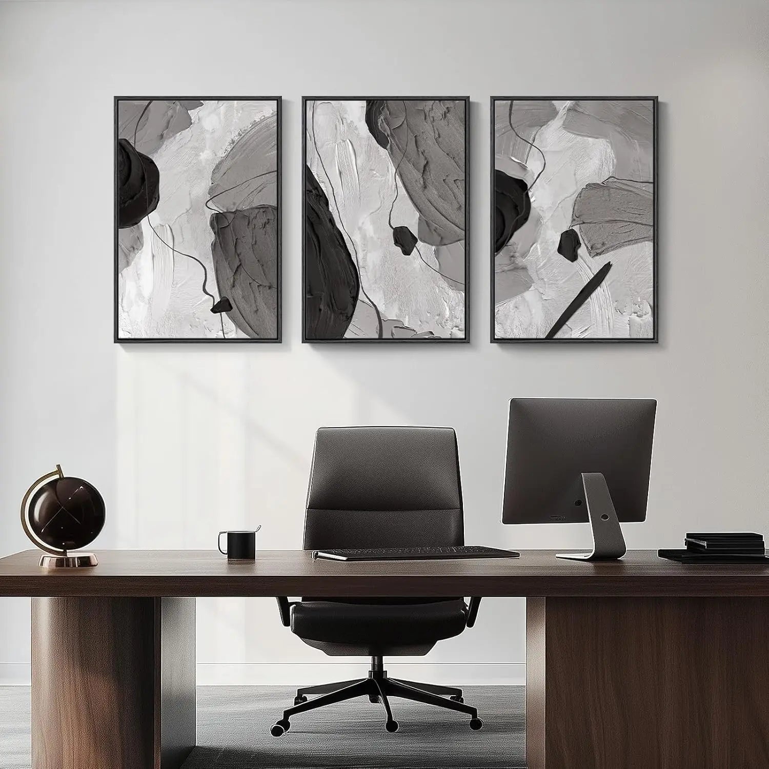 Modern office setup with a desk, chair, and abstract wall art.