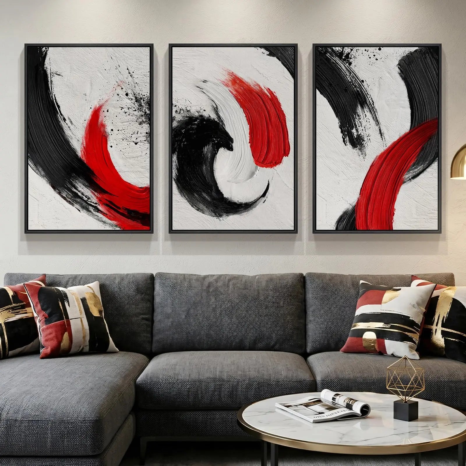 Gray sectional sofa with abstract art above and a small table with decor items in front.