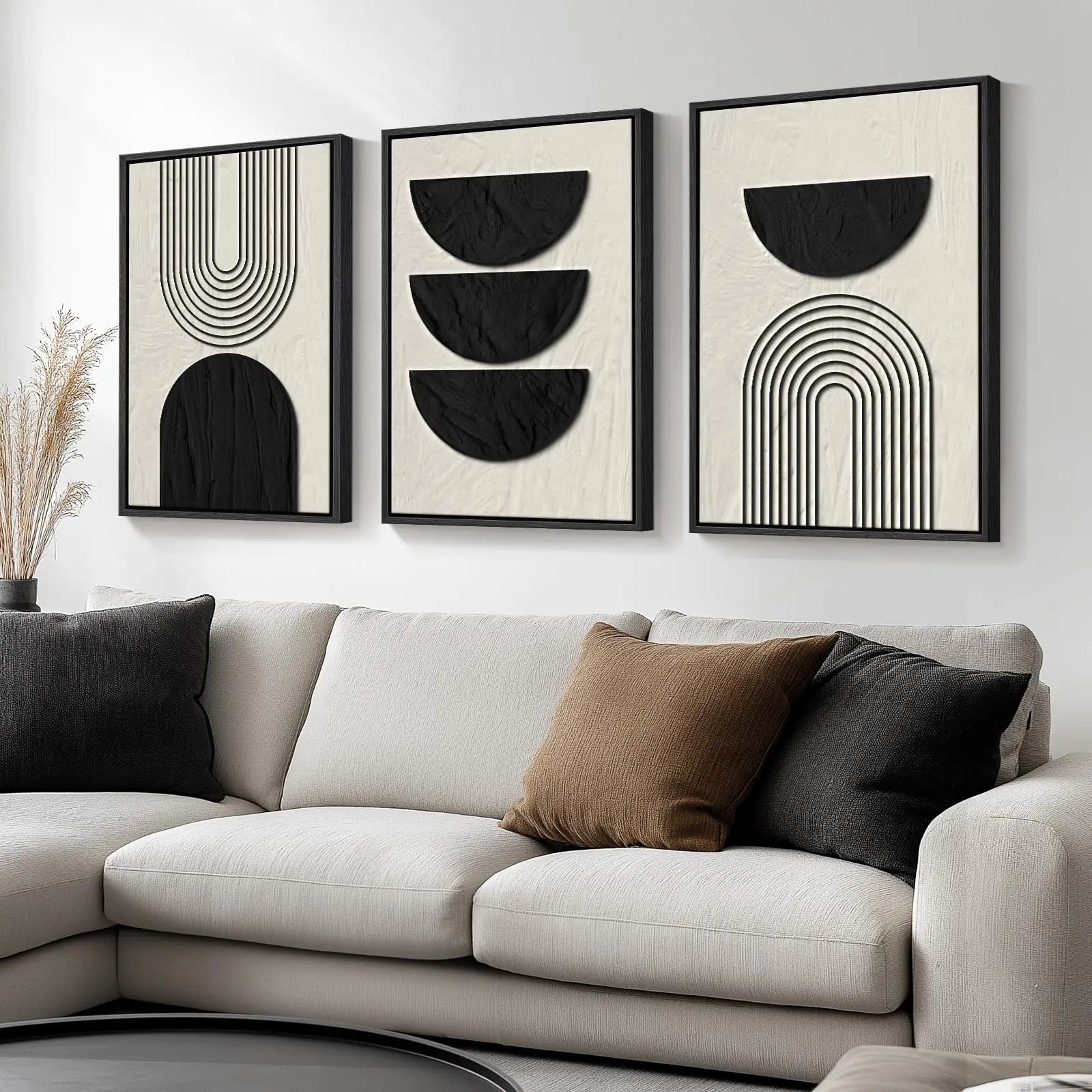 Modern living room with a beige sectional sofa and abstract wall art.