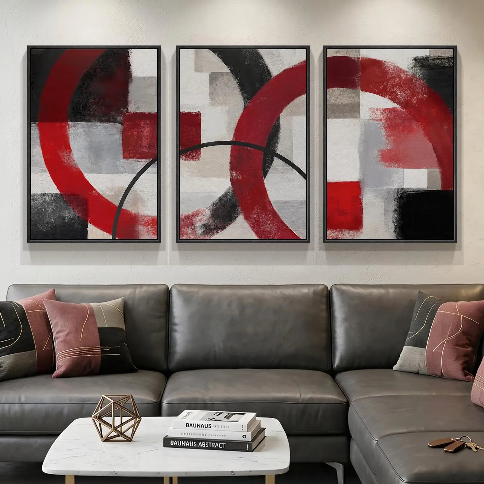 Gray sectional sofa with abstract art on the wall