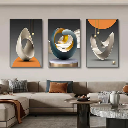 Three abstract art pieces on a wall above a sofa in a living room.