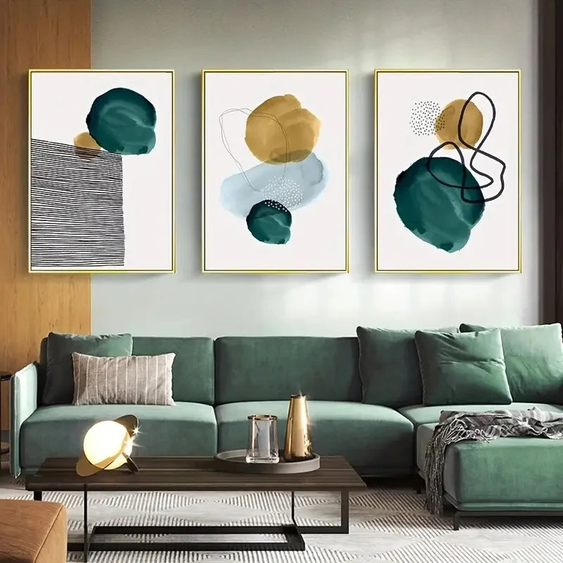 Modern living room with a green sectional sofa and abstract art on the wall.