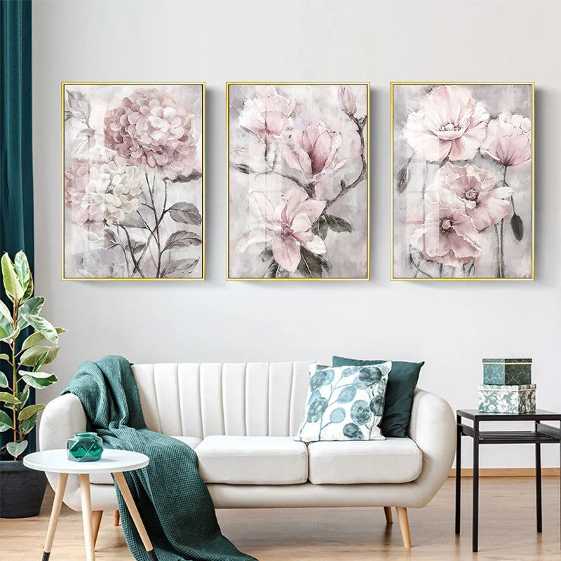 Floral wall art above a white sofa in a living room setting