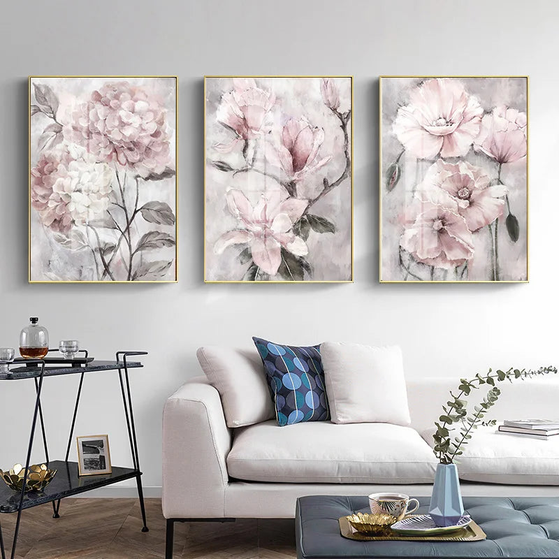 Floral wall art above a sofa in a living room setting