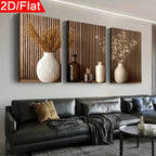 Decorative wall art with vases and plants above a sofa in a living room.