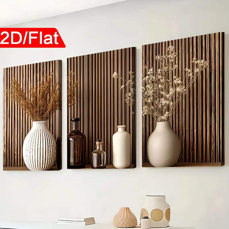 Three wall art panels with decorative vases and plants on a white wall.