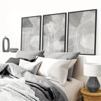 Bedroom with abstract wall art and decorative pillows
