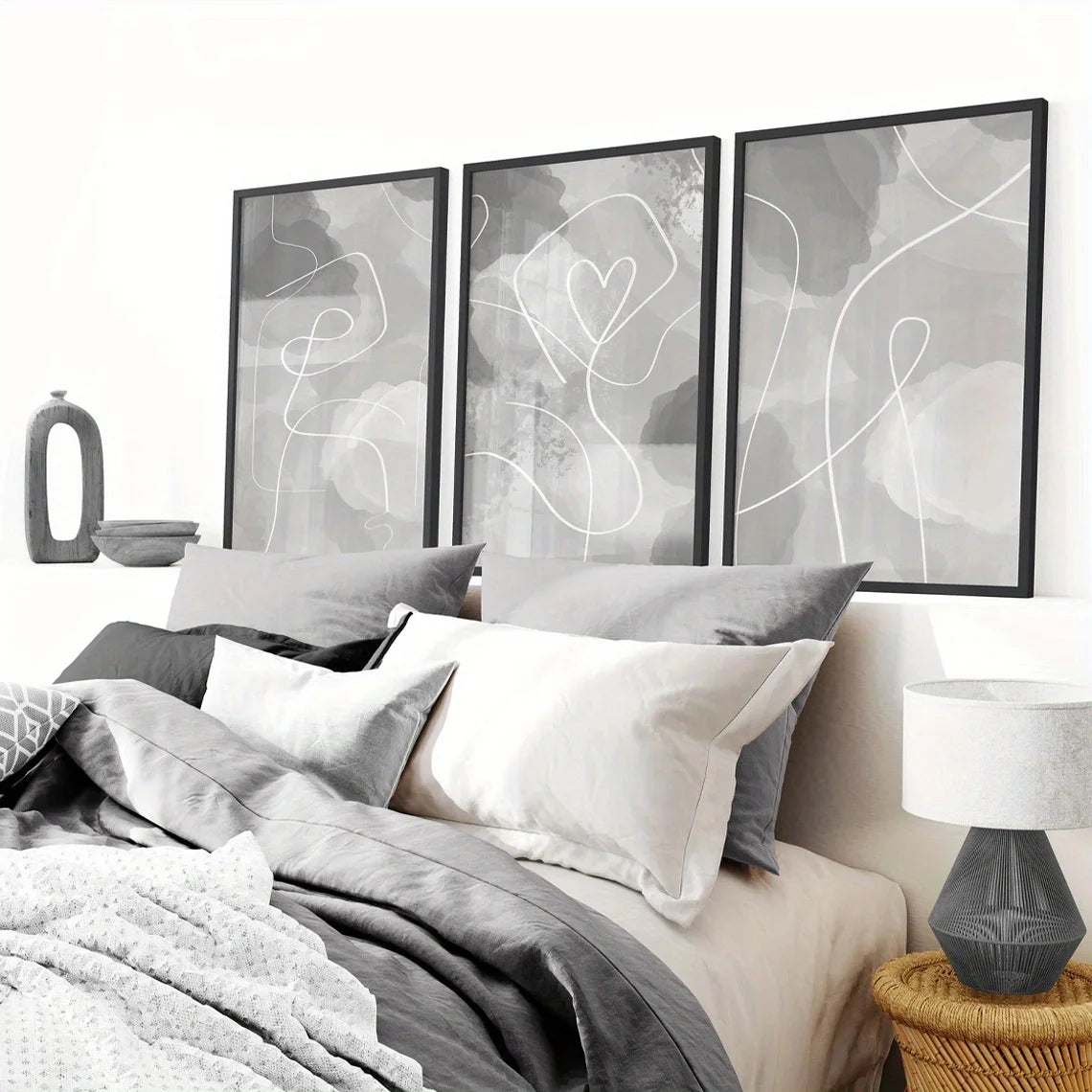 Bedroom with abstract wall art and decorative pillows