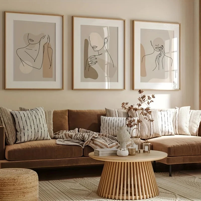 Living room with brown sofa, wooden coffee table, and abstract art on the wall.