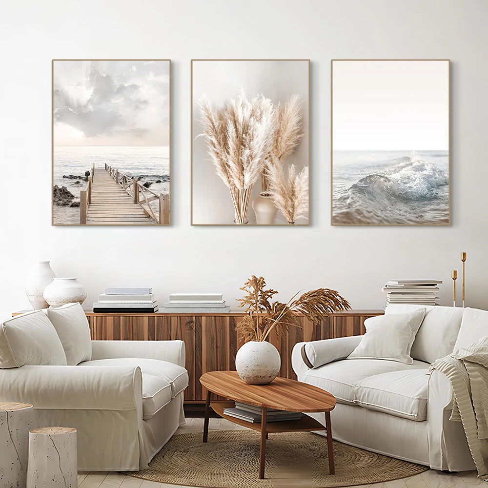 Living room with white sofas, a wooden coffee table, and wall art depicting nature.