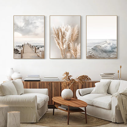 Living room with white sofas, a wooden coffee table, and wall art depicting nature.