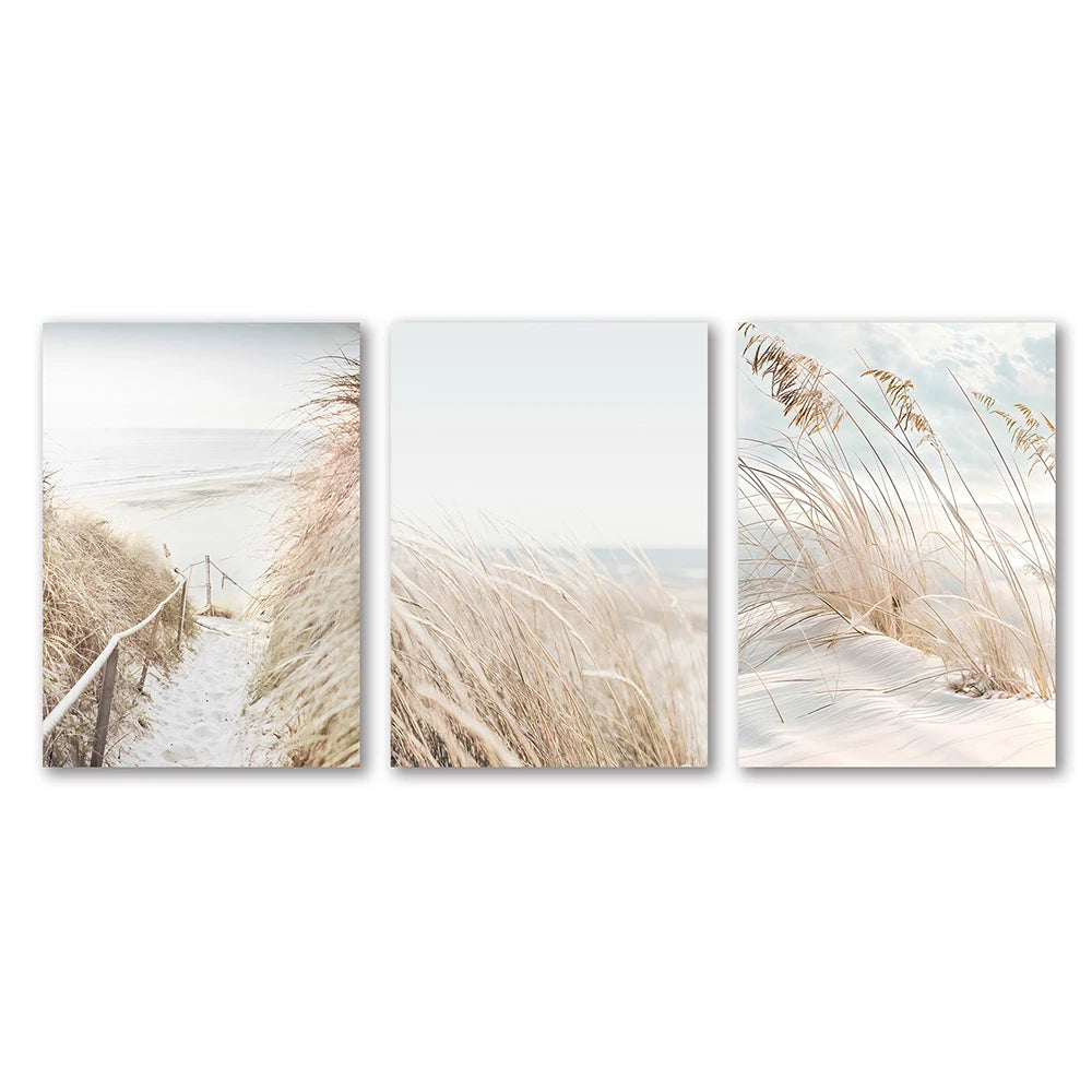 Set of three coastal-themed wall art prints featuring sand dunes and a pathway.
