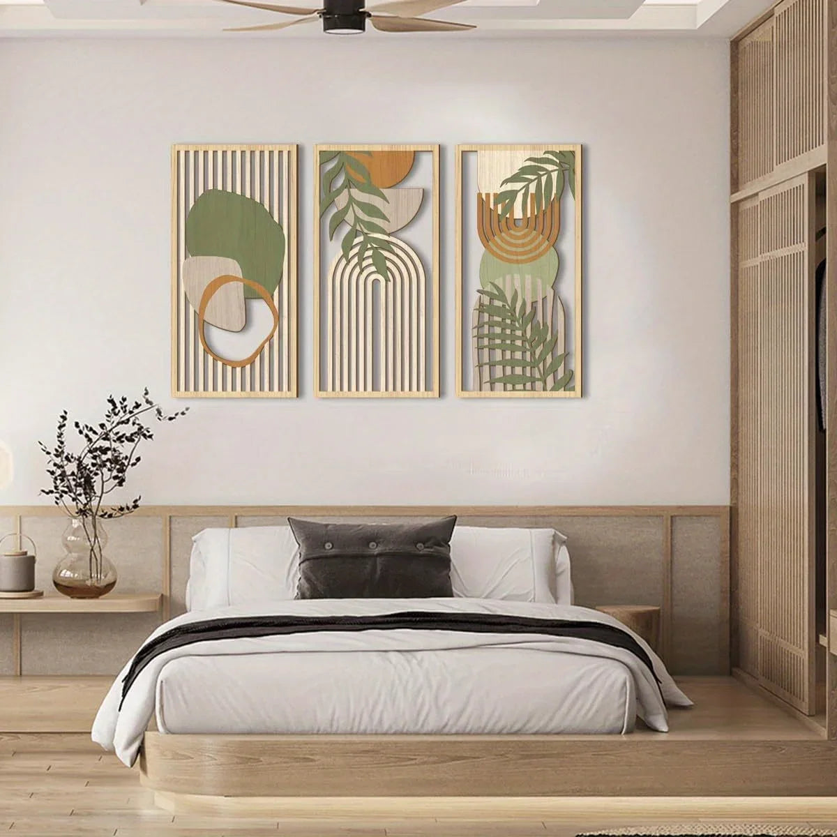 Modern bedroom with a bed, nightstands, and wall art