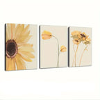 Set of three framed floral artworks with yellow flowers on a beige background.
