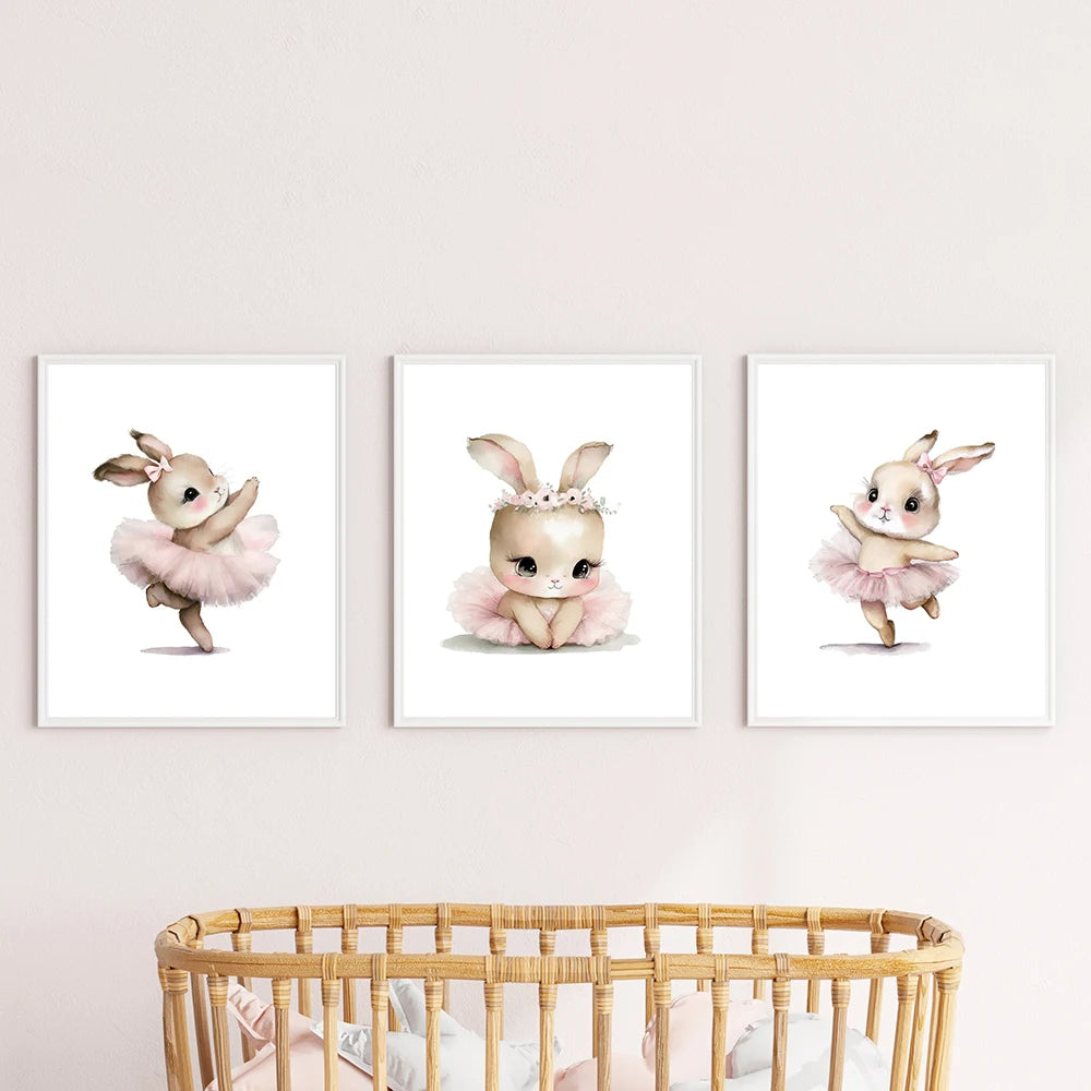 Three framed illustrations of a bunny in a tutu on a wall above a crib.