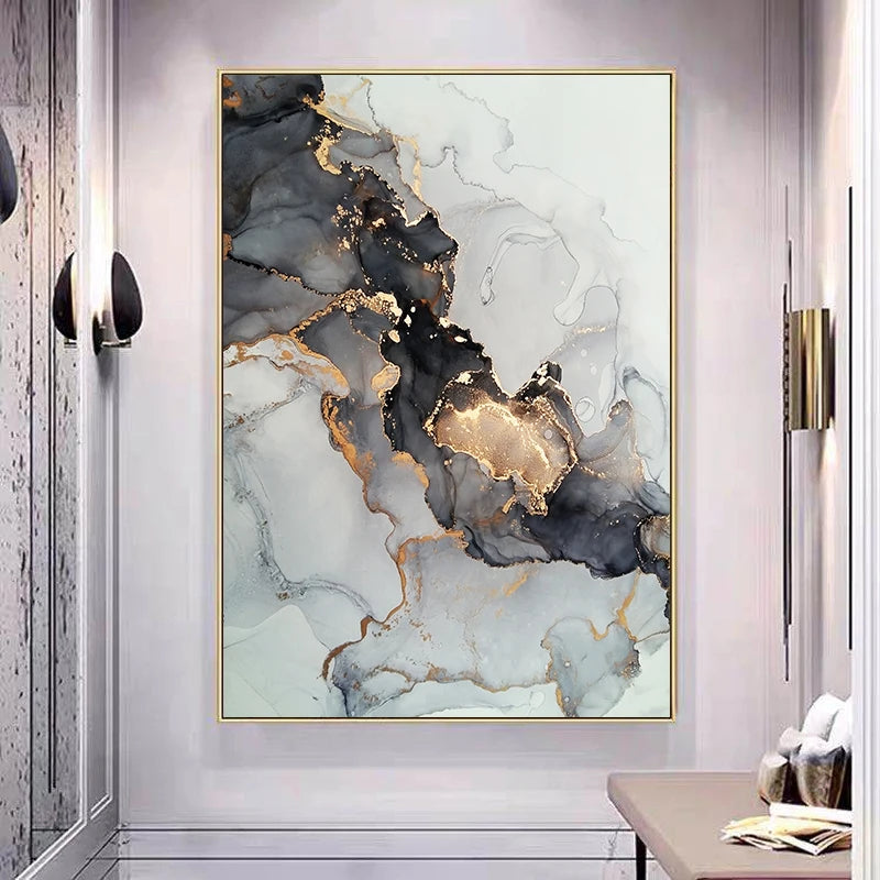 Abstract art piece with gold and black accents in a modern interior setting.