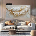 Decorative wall art of a feather in a living room setting with a sofa and coffee table.