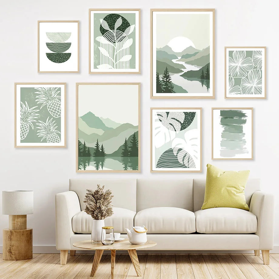 Living room with a beige sofa, decorative pillows, and wall art featuring green and white abstract designs.