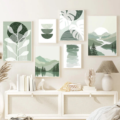 Set of six green and white abstract wall art pieces on a wall with a white console table below.