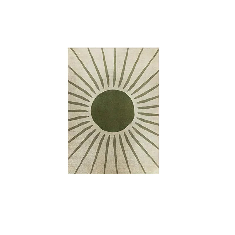 Rug with sunburst pattern and green center on beige background
